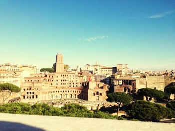 Cityscape against blue sky