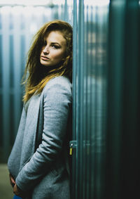 Portrait of young woman looking away