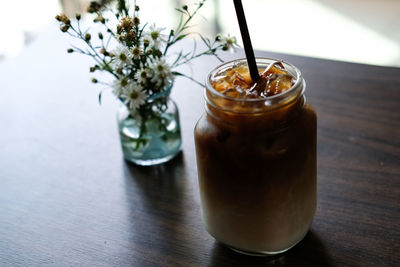 Close-up of iced coffee on table