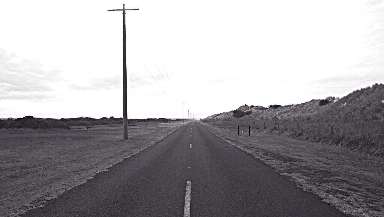 the way forward, road, transportation, diminishing perspective, empty, landscape, vanishing point, clear sky, long, tranquil scene, tranquility, mountain, country road, sky, outdoors, non-urban scene, countryside, day, solitude, surface level, nature, remote, scenics, mountain range, white line, empty road