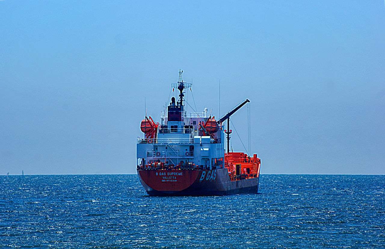 VIEW OF SHIP IN SEA AGAINST CLEAR SKY