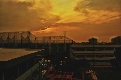 High angle view of buildings against sky during sunset