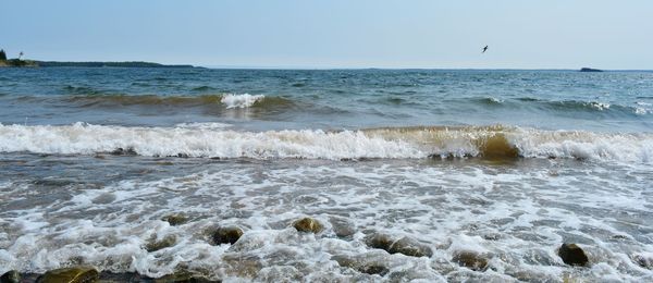 Scenic view of sea against clear sky