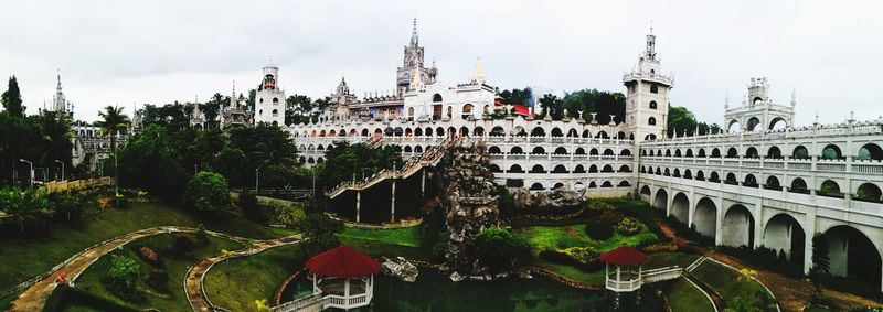 Panoramic view of cathedral in city against sky