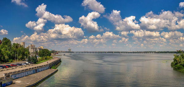 Monument to the fallen afghan warriors on the dnipro embankment in ukraine on a sunny summer day