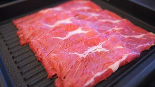 Close-up of meat on barbecue grill