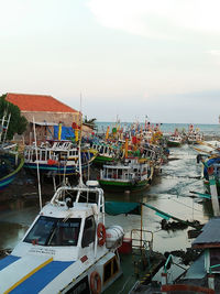 High angle view of fishing boats moored at harbor