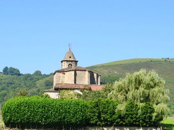 Chapel against clear blue sky