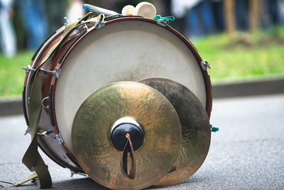 Close-up of musical instrument on road