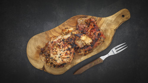 High angle view of bread on cutting board