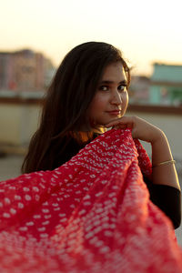 Portrait of woman holding dupatta