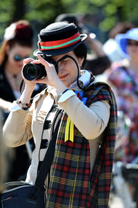 Man photographing with camera