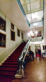People in illuminated room