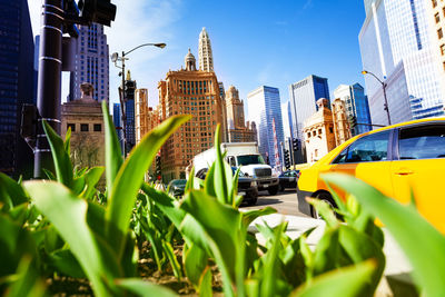 Modern buildings in city against sky