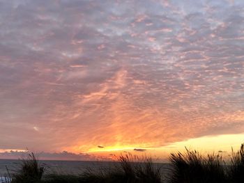 Scenic view of dramatic sky during sunset