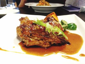 Close-up of served food in plate