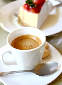 Close-up of coffee in cup on table