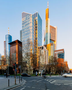 Skyscrapers in the city in beautiful evening light under the blue sky