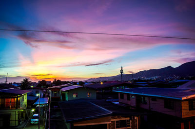 City against sky during sunset