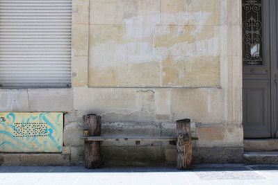 Bench in front of old building