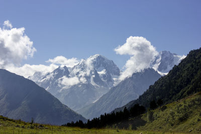 Low angle view of mountains against sky