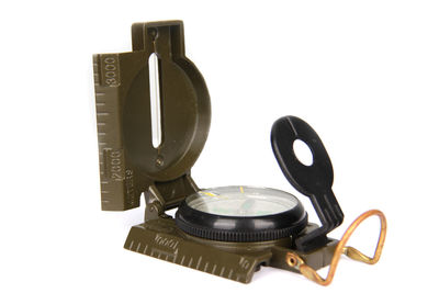 Close-up of camera against white background