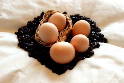 Close-up of eggs on bed