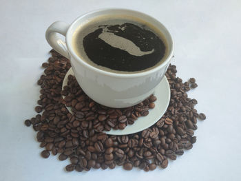 High angle view of coffee cup on table