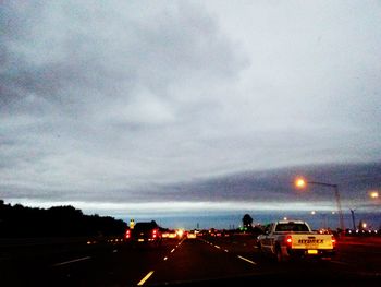 Road against cloudy sky