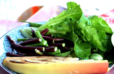 Close-up of vegetables in plate on table