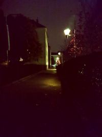 Illuminated street lights at night