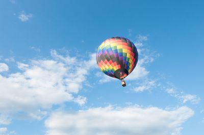 Hot air balloons flying at sunset