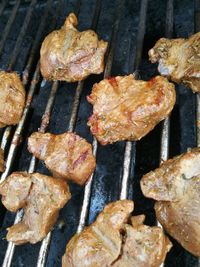 Close-up of meat on barbecue grill