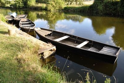 Boat moored in lake