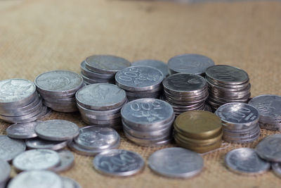 High angle view of coins on table