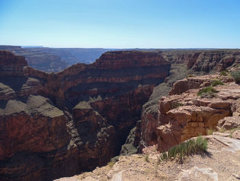 Scenic view of rock formations against sky