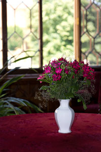 Close-up of flower vase on table