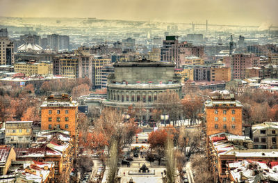 High angle view of street amidst buildings in city