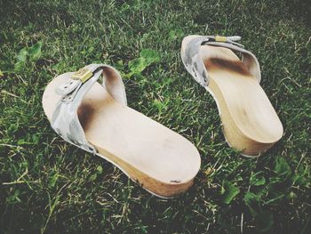 High angle view of shoes on field