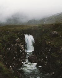 River flowing through rocks