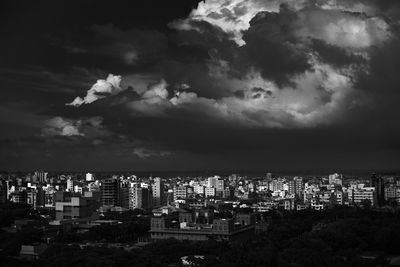 Cityscape against sky at night