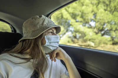 Portrait of woman in car