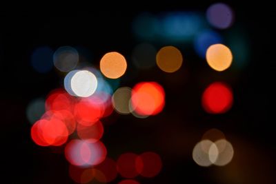 Defocused image of illuminated lights at night