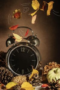 High angle view of clock on table