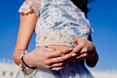 Close-up of hand holding headband