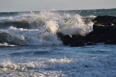 Waves splashing on rocks