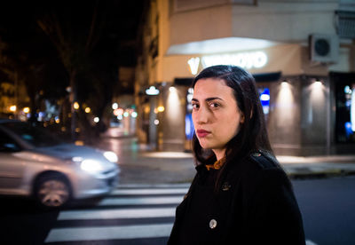 Woman on road at night