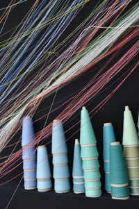 Close-up of multi colored spools and threads