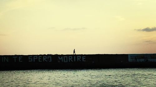 View of built structure at sunset