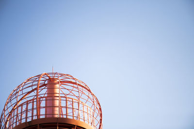 Low angle view of building against clear blue sky